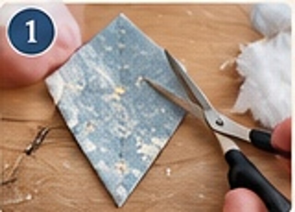 Cut patchwork flap pieces in dusty ice blue, winter ivory and frosted sage ready to pair with batting