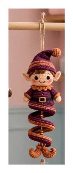 Finished Elf spiral ornament — plum spiral with rust trim, striped pointed hat, pointed ears, and rust collar