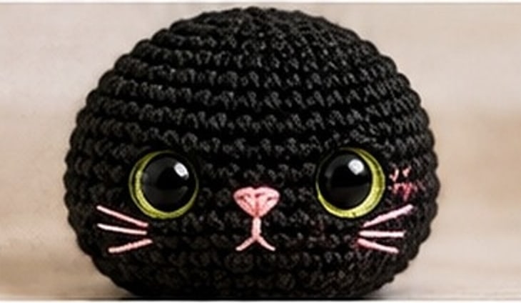 Finished cat-face head with safety eyes, pink nose and whiskers